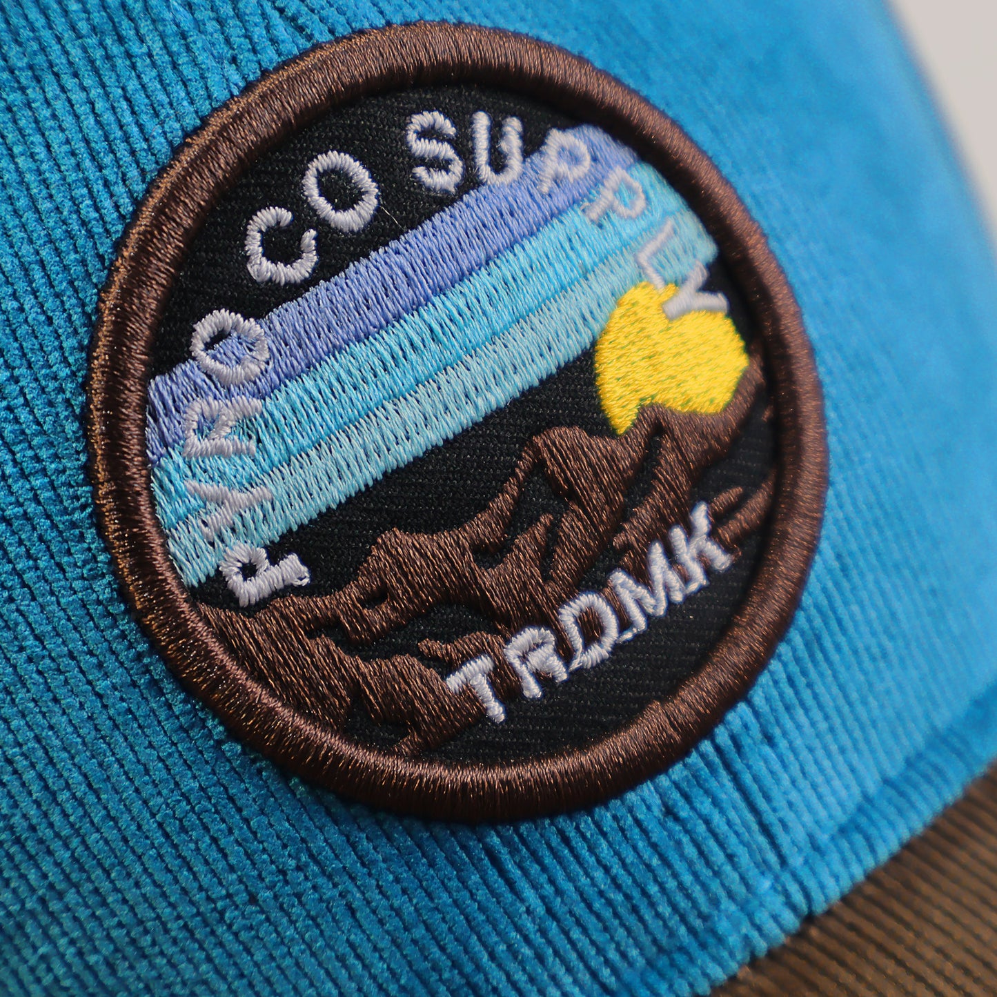 Colorful Landscape Pyro Cord Cap - Azul Vis Marrón
